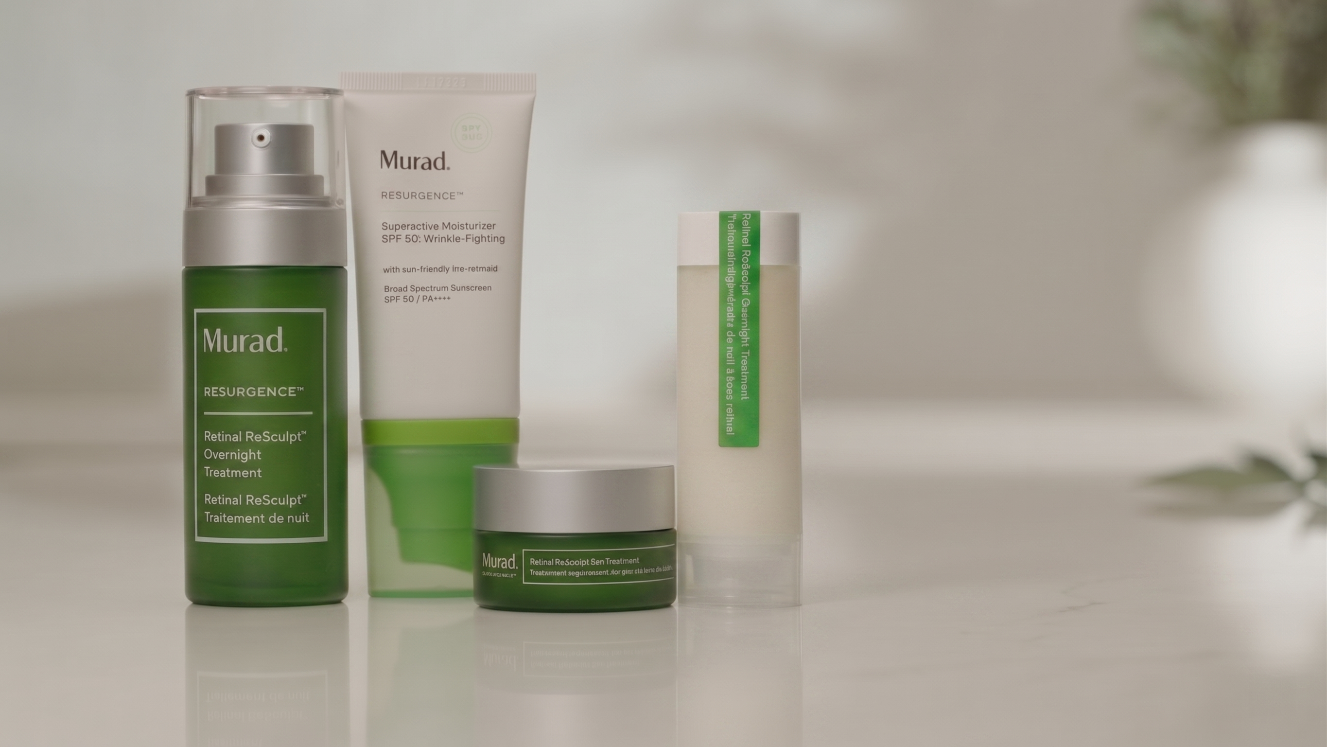 Set of Murad Resurgence skincare products on a neutral background